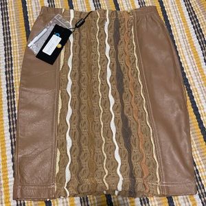 New COOGI leather trim skirt